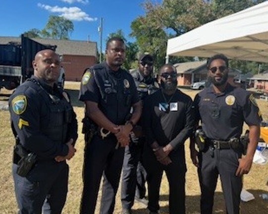 Five police officers stand for picture.